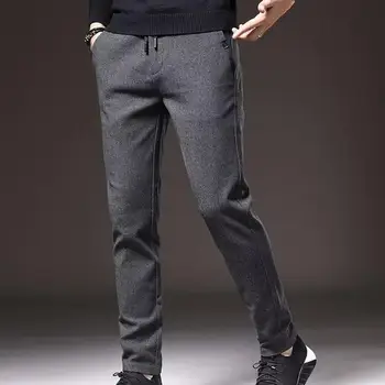 Ежедневни панталони Regular Fit мъжете прави обикновен панталон със средна ластик на талията и завязками с джобове с дължина до щиколоток за удобство.